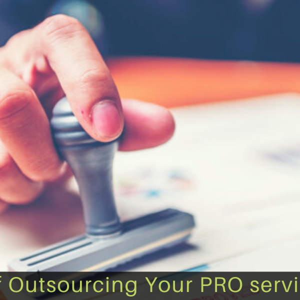 Benefits-of-Outsourcing-Your-PRO-services-in-UAE Close-up hand stamping of businessman for signing approval on documents